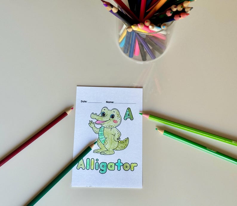 May include: A printable coloring page featuring an alligator with the letter A and the word "Alligator" below. The page has lines for the date and name.