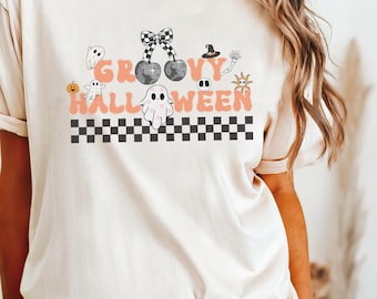 Groovy Halloween Retro-Inspired graphic T-Shirt, Groovy Halloween Fun T-Shirt with Ghosts and Witches, vintage Halloween style, ghost shirt