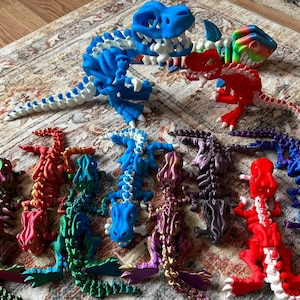 Articulating T-Rex skeleton  fidget toy by Flexi Factory