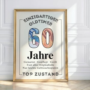 Puede incluir: Un marco dorado con la inscripción "EINZIGARTIGER OLDTIMER 60 Jahre". El número 60 está relleno de patrones coloridos. El texto adicional incluye "Gewartet, Gepflegt, Geölt" y "TOP ZUSTAND."