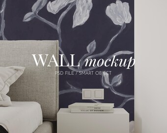 May include: A wall mockup featuring a dark purple wallpaper with white painted floral patterns, a light gray upholstered headboard, a white nightstand with two books, and a light switch. The text reads WALL mockup PSD FILE / SMART OBJECT.