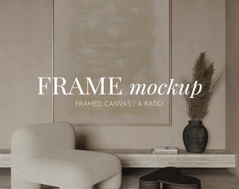 May include: An interior scene in neutral tones, featuring a large framed canvas with abstract art. A beige armchair, a black coffee table, and a decorative vase with dried plants are in the foreground. The text "FRAME mockup" is displayed.
