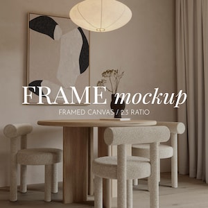 May include: A framed abstract art print with black and white shapes on a beige background hangs on a wall in a living room. The room features a wooden table with four chairs, a white lamp, and a beige curtain.