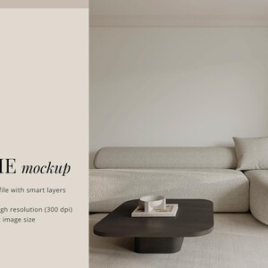 May include: A mockup of a frame hanging on a wall in a living room. The frame is empty and ready for your artwork. The room is decorated in a minimalist style with a light gray sofa, a coffee table, and a rug.