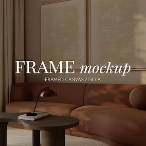 May include: A modern living room with a brown sofa, a dark coffee table, and two framed canvases. A red desk lamp is on the table. The image includes the text "FRAME mockup".