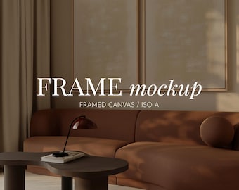 May include: A living room scene featuring a brown sofa, a dark brown coffee table, and two framed canvases. A red desk lamp sits on the coffee table. The text "FRAME mockup" is displayed on the image.