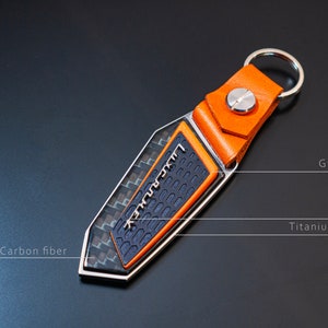 Luxury keychain for Lamborghini lovers carbon fiber, Titanium lettering, Leather, Urus, Aventador, Huracan, murcielago, Gallardo, Countach