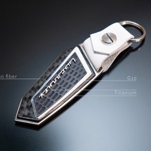 Luxury keychain for Lamborghini lovers carbon fiber, bronze lettering, Leather, Urus, Aventador, Huracan, murcielago, Gallardo, Countach