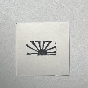 Stampa in miniatura fatta a mano con gomma: Piccolo sole