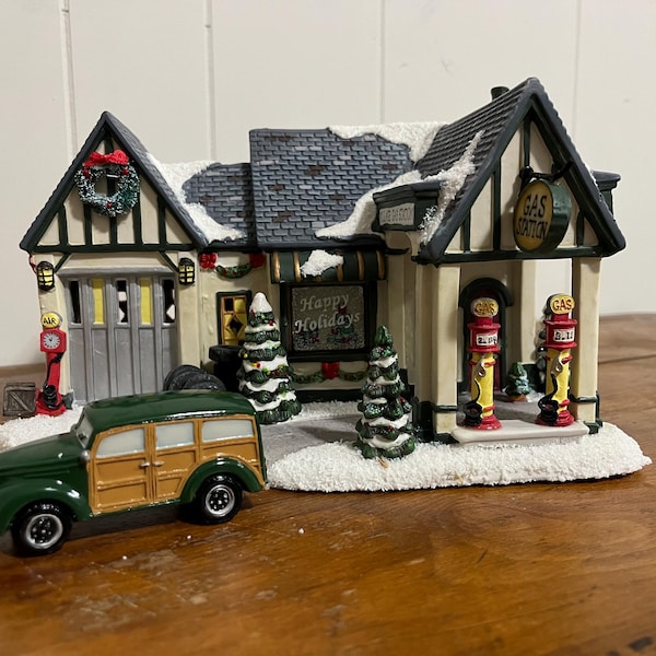 St. Nicholas Square Village Gas Station: Illuminated Christmas Decor