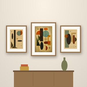 May include: Three framed prints with abstract geometric shapes in orange, blue, green, and black, displayed above a brown sideboard. Text reads: Crestline Color Co. Totem. Set of 5, 2:3 format, digital download. Includes a green vase and boxes.