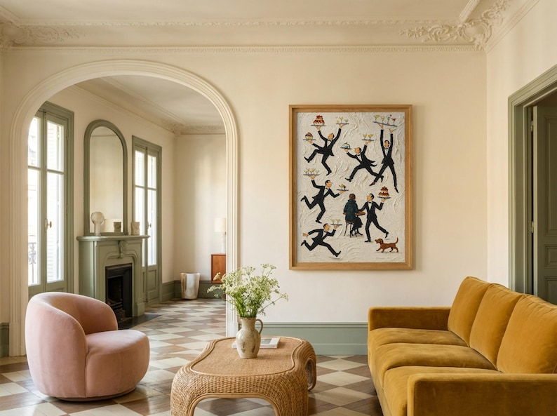 May include: A framed rectangular wall art piece featuring a whimsical illustration of multiple waiters in black suits carrying trays of food and drinks, with a small brown dog, displayed in a room with a pink armchair and a mustard yellow sofa.