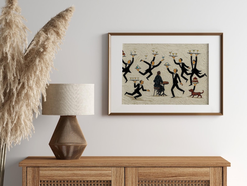 May include: A framed wall art print featuring a whimsical illustration of multiple waiters in black tuxedos balancing trays of drinks and food around a seated figure at a small table, with a small brown dog standing near a tiered cake tray.