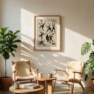 May include: A framed rectangular wall art print featuring a whimsical illustration of multiple waiters in black suits carrying trays of food and drinks around a seated couple, with a small brown dog nearby, all set against a light beige background.