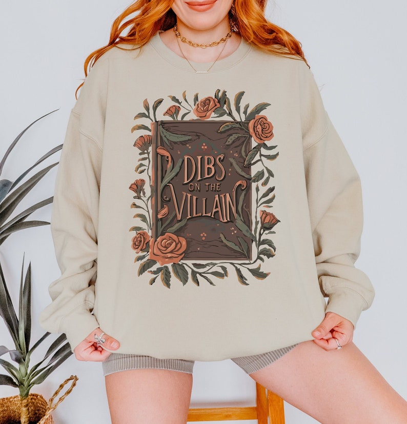Dibs on the villain bookish sweatshirt with a dark academia vibe floral book