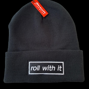 Roll with It embroidered on a Black Beanie. Iconic oasis inspired. Manchester music, Rock, Liam, Noel. Heaton Park