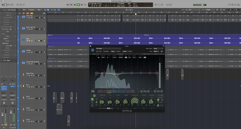 May include: A computer screen displaying audio editing software. The interface shows a waveform, equalizer settings, and various control panels. The software appears to be used for music production or sound design.