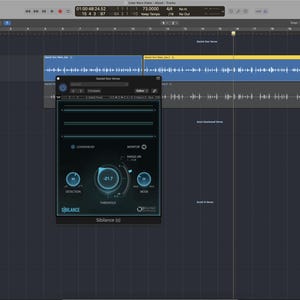 May include: A computer screen displaying audio editing software. The interface features a dark theme with various controls, waveforms, and a pop-up window labeled "Spectral Gate Stereo." The window has dials and sliders for audio adjustments.