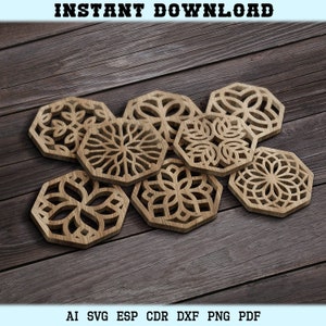 May include: Set of six wooden coasters with intricate laser cut designs. Each coaster features a different geometric pattern in a light brown color.