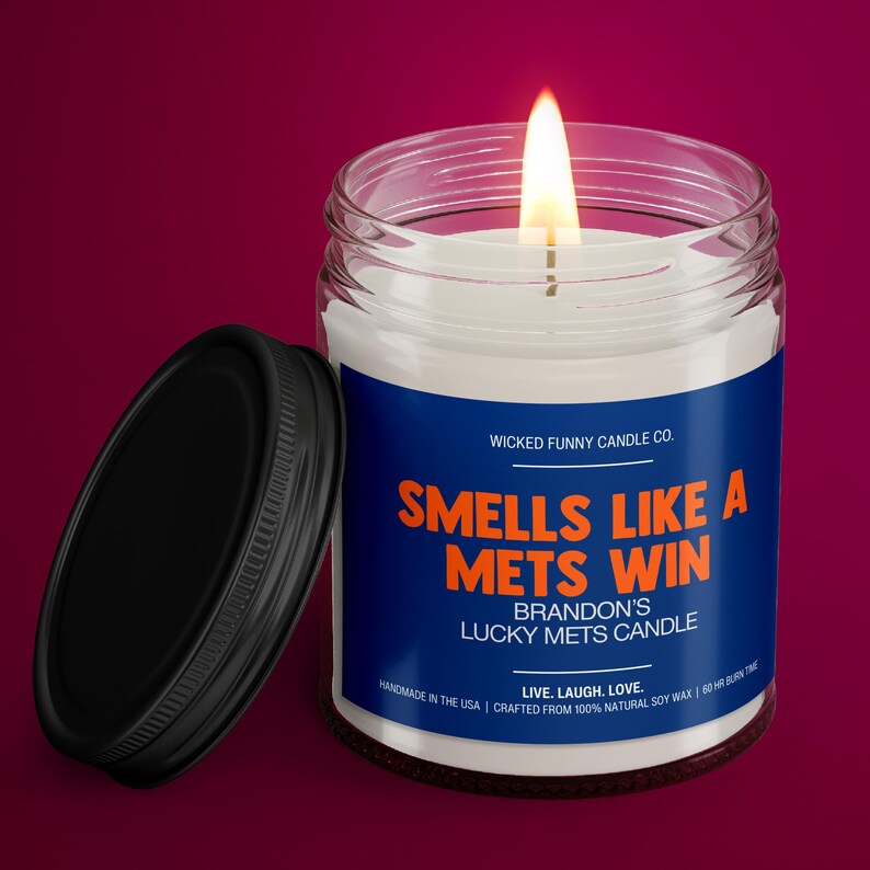 a candle that is next to a container