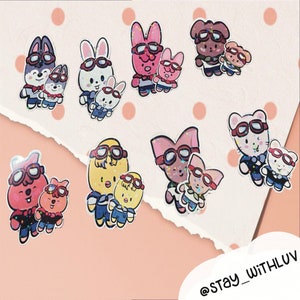 May include: A set of ten colorful cartoon animal stickers with goggles. Each sticker features a different animal, including a fox, a bunny, a pig, a dog, and a cat. The stickers are perfect for adding a touch of whimsy to your planner, laptop, or water bottle.