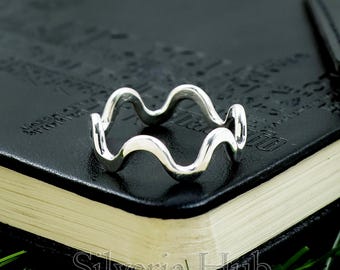 Sterlingzilveren golfring: minimalistische zigzagband