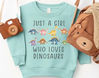 Just a Girl Who Loves Dinosaurs Sweatshirt | Cute Pink Dino Toddler Crewneck | Girly Dinosaur Birthday Shirt | Youth T-Rex Gift