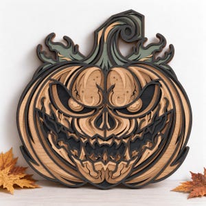 May include: A multi-layered wooden wall art piece shaped like a jack-o'-lantern with a menacing expression. The design features intricate cutouts in shades of natural wood, dark charcoal, and muted sage green, creating a dimensional effect.