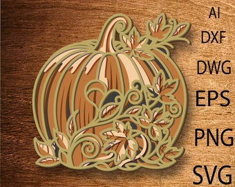 May include: A brown pumpkin with a detailed, intricate design of leaves and swirls. The pumpkin is surrounded by a decorative border of leaves.