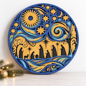 May include: A circular multi-layered wooden wall art piece featuring a nativity scene silhouette in black against a yellow background, surrounded by blue and yellow swirling patterns, stars, and a sun, inspired by a starry night aesthetic.