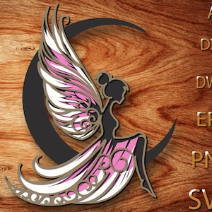 May include: A layered fairy silhouette with pink and white wings, seated on a black crescent moon. The fairy's dress is pink and white. The image is set against a wood grain background. Text on the right side includes AI, DXF, DWG, EPS, PNG, and SVG.