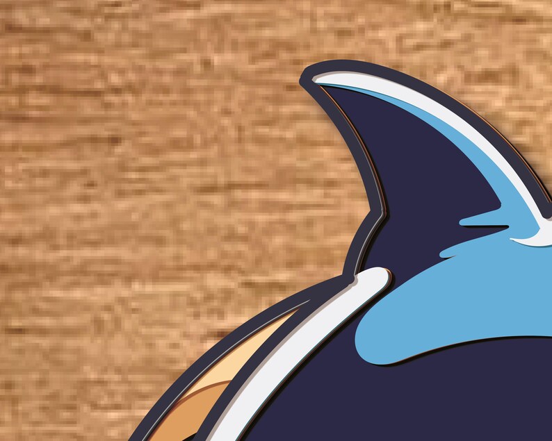 May include: A blue and white cartoon orca whale with a black fin. The orca is facing right and has a white belly and a black back.
