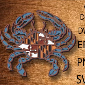 Może przedstawiać: Niebieski krab z flagą stanu Maryland na skorupie. Krab jest popularnym symbolem stanu.