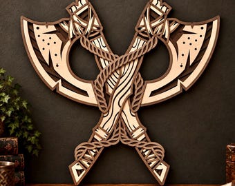 May include: A layered wooden wall art piece featuring two crossed battle axes. The design is constructed from light and dark brown wood, showcasing intricate cut-out details, rope-like carvings on the handles, and a symmetrical, overlapping composition.