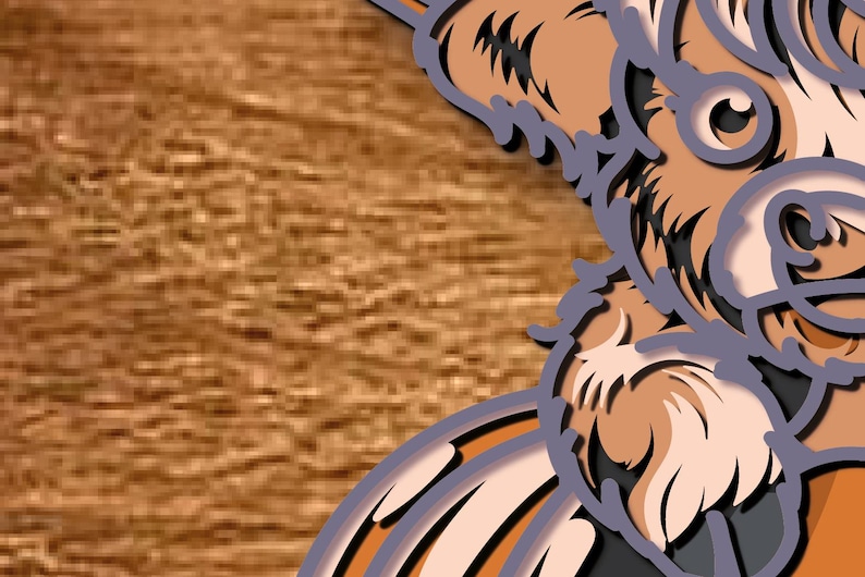 May include: A layered paper artwork depicting a dog's face, using shades of brown, tan, and grey. The art is set against a textured, wood-effect background, highlighting the dog's eye and fur details.