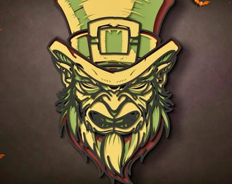 May include: A layered wall art piece featuring a stylized leprechaun head wearing a tall green hat with a buckle. The design uses shades of yellow, light green, and dark green with black outlines, creating a dimensional effect on a dark background.