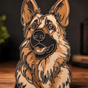 May include: A multi-layered wooden wall art piece depicting a German Shepherd dog. The design features stacked cutouts in shades of tan, cream, brown, and black, creating a dimensional portrait of the canine with pointed ears and a dark muzzle.