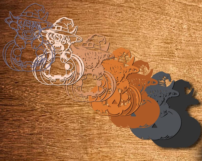 May include: A layered Halloween decoration featuring a witch hat and a pumpkin. The design includes a Highland cow character. The colour palette ranges from white to orange and grey, with a wooden background.