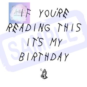 May include: White background with the text "IF YOU'RE READING THIS IT'S MY BIRTHDAY" in black. A small graphic of praying hands is at the bottom. A logo for "Amethyst Custom Crafts" is in the upper left corner.