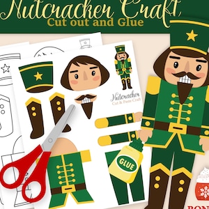 Może przedstawiać: Drukowany zestaw rzemieślniczy Dziadka do Orzechów z wyciętymi elementami, nożyczkami i klejem. Projekt obejmuje zielono-złotego żołnierza Dziadka do Orzechów, kubek bonusowy oraz tekst "Nutcracker Craft" i "Instant Download".