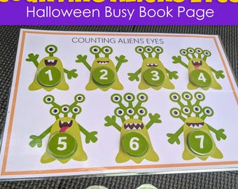 May include: A Halloween-themed busy book page titled "Counting Aliens Eyes." The page features green alien illustrations with varying numbers of eyes, numbered from 1 to 7. Additional circular number tokens from 8 to 10 are also included. The words "Instant Download" are at the bottom.