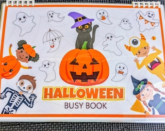 May include: A Halloween-themed busy book with illustrations of ghosts, pumpkins, a black cat wearing a witch hat, and children in costumes. The cover features the words "HALLOWEEN BUSY BOOK" in orange and white.