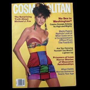 May include: Cosmopolitan magazine cover with a woman in a patchwork dress. The cover includes text: "The Surprising Truth About Michael J. Fox" and "No Sex in Washington?"