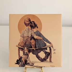 May include: A rustic wooden sign with the text "Welcome to our home" in white lettering. The sign features a distressed finish and a simple, inviting design, perfect for entryway decor.