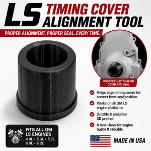 May include: A black cylindrical LS timing cover alignment tool for GM engines. The text reads LS TIMING COVER ALIGNMENT TOOL, PROPER ALIGNMENT. PROPER SEAL. EVERY TIME., FITS ALL GM LS ENGINES 4.8L 5.3L 5.7L 6.0L 6.2L, and MADE IN USA.