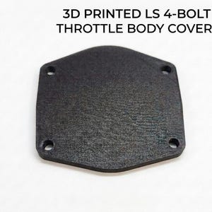 May include: A black 3D printed LS 4-bolt throttle body cover with a textured surface and four circular mounting holes at the corners. The text 3D PRINTED LS 4-BOLT THROTTLE BODY COVER is printed in black above the object on a white background.