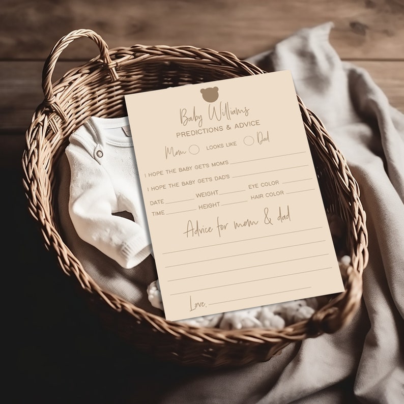 May include: A beige card with the text "Baby Williams Predictions & Advice" and a bear icon. The card has lines for guests to write predictions about the baby's appearance, weight, and advice for the parents.