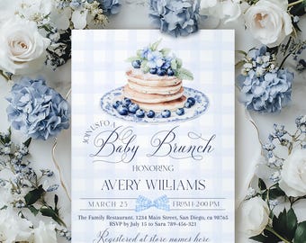 May include: A baby brunch invitation with a watercolor illustration of pancakes and blueberries on a blue and white checkered background. The invitation includes the text "Join us for a Baby Brunch" and event details.
