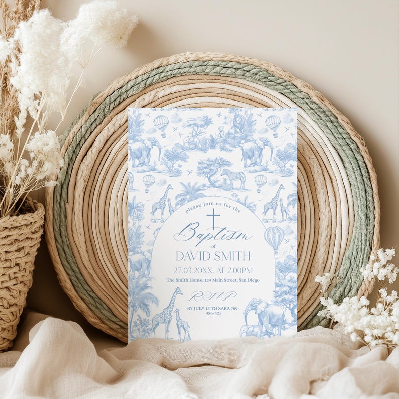 May include: A baptism invitation card with a blue and white safari animal design. The card includes the text "please join us for the Baptism of DAVID SMITH" and RSVP information. The card is set against a woven background.