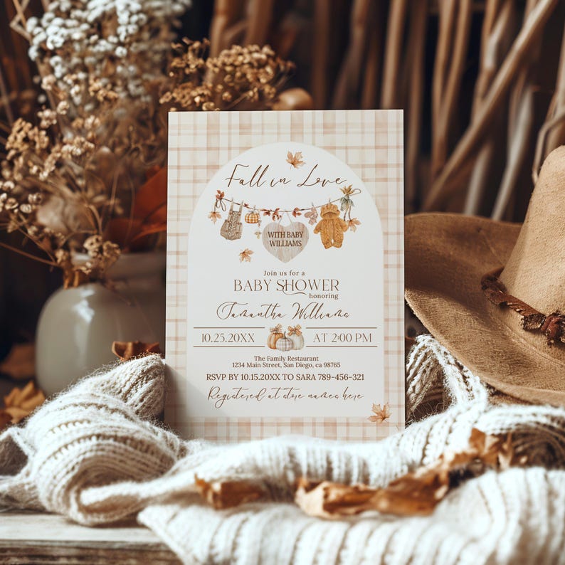 May include: A baby shower invitation with a plaid background and fall-themed illustrations. The text reads "Fall in Love" and announces a baby shower honoring Samantha Williams. The invitation includes the date, time, and RSVP information.